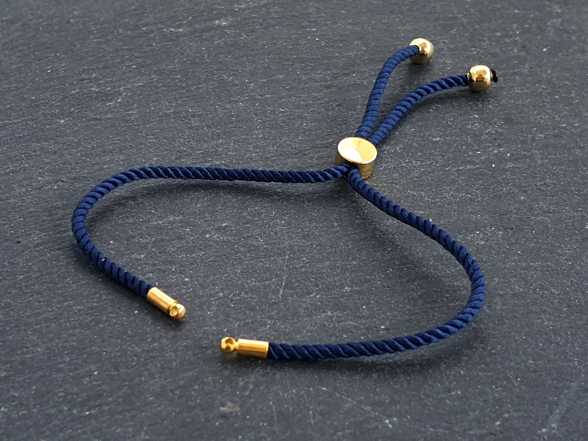 Navy Blue Adjustable Rope Slider Bolo Cord Bracelet Blank, 2mm, Gold Sliding Bead 1pc Navy Blue Adjustable Rope Slider Bolo Cord Bracelet Blank, 2mm, Gold Sliding Bead 1pc