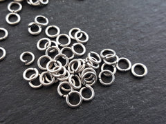 50 pcs - 5.5mm Matte Silver Plated Brass jump rings