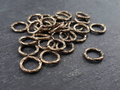 8mm Twisted Etched Jump Rings Antique Bronze Plated - 30pcs