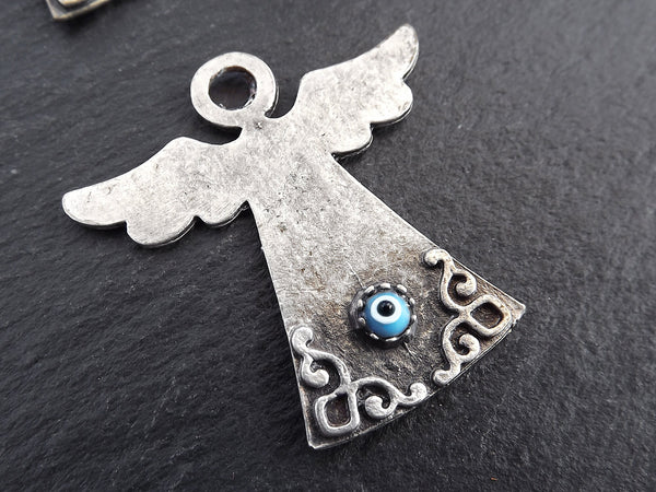 Evil Eye Angel Pendant Charm, Lucky Charm, Protective, Amulet, Good Luck, Protect, Pale Blue Evil Eye, Artisan Glass Bead, Matte Silver